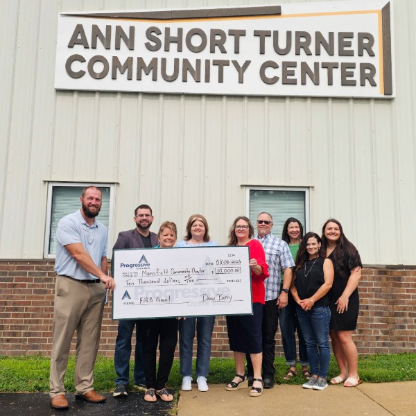 Mansfield Community Center receiving FHLB Impact Funds Check from Progressive Ozark Bank