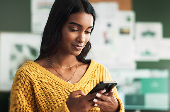 woman holding mobile phone